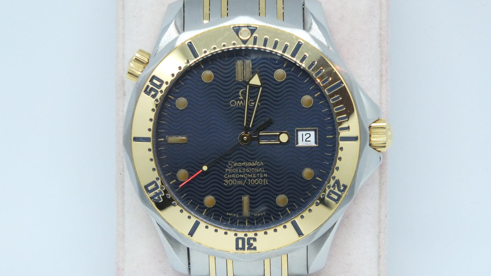 Omega Seamaster Professional with blue wave dial and gold accents